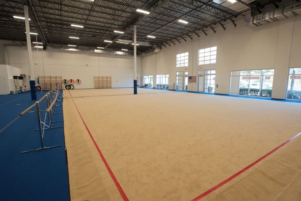 The full rhythmic gymnastics carpet and training floor at Rhythmic Art in Dania Beach